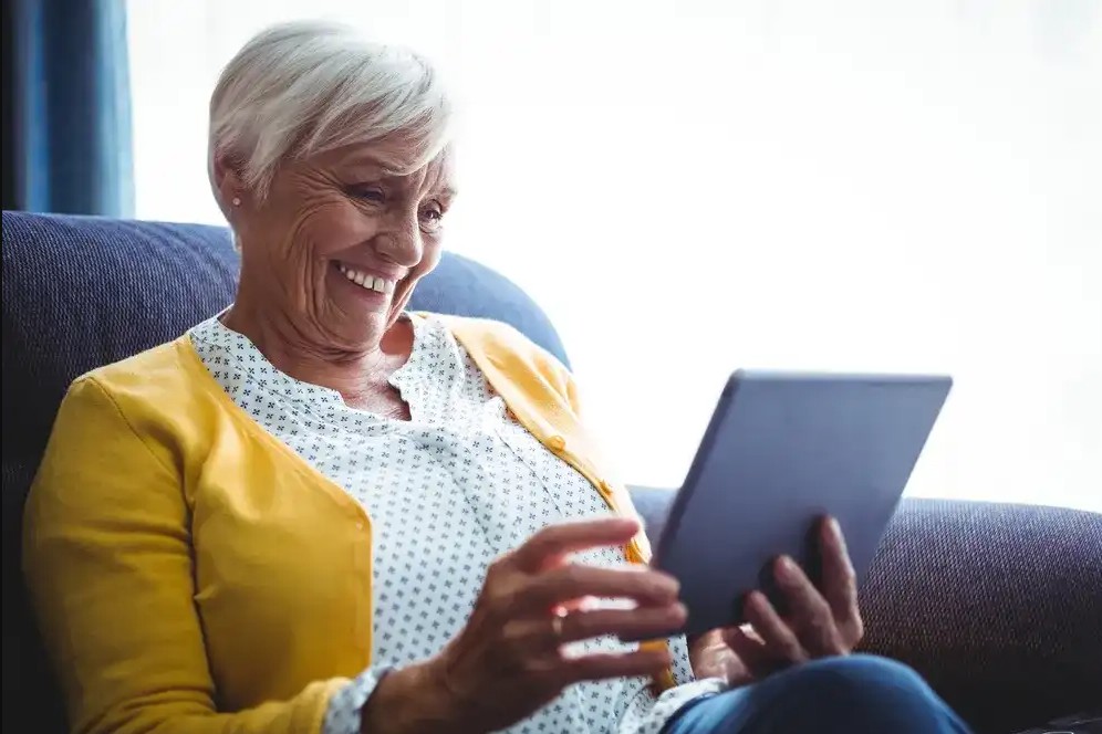 A woman looking up cost effective senior housing