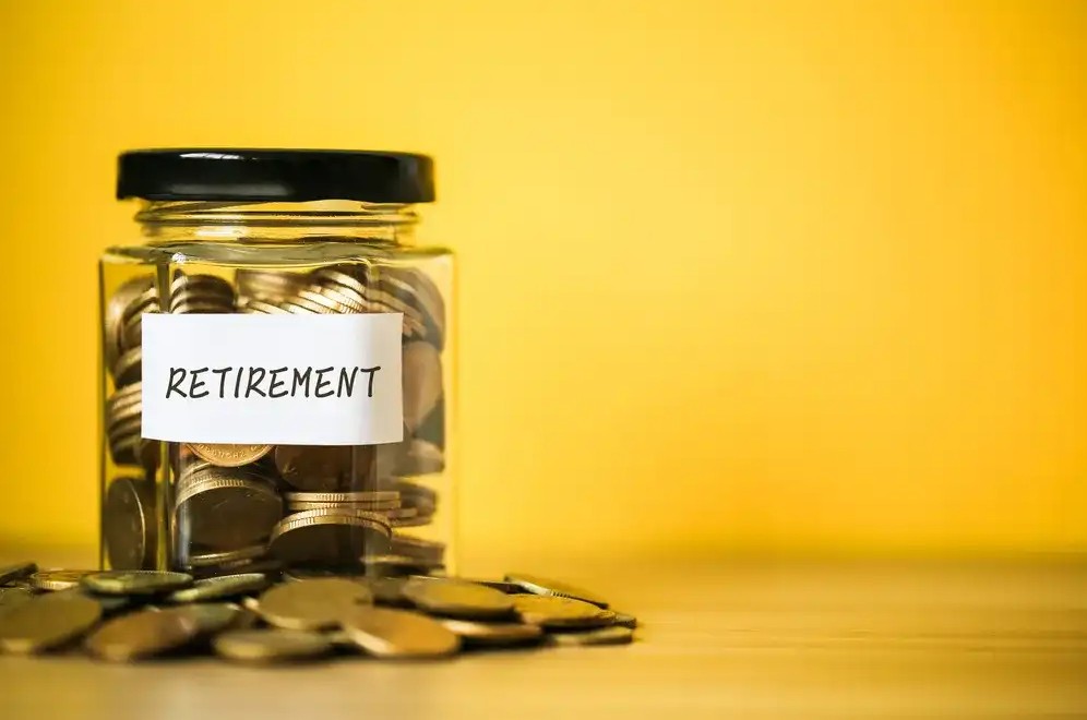 A jar of money labeled retirement