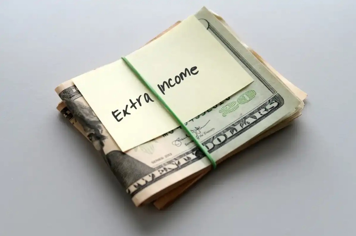 Wad of money that says extra income