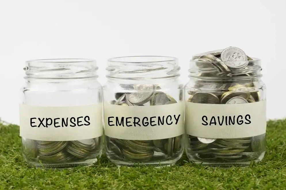 Three jars labeled for savings