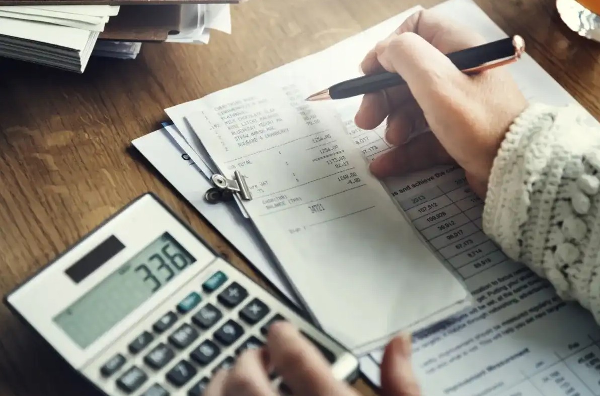 A person working to maximize income