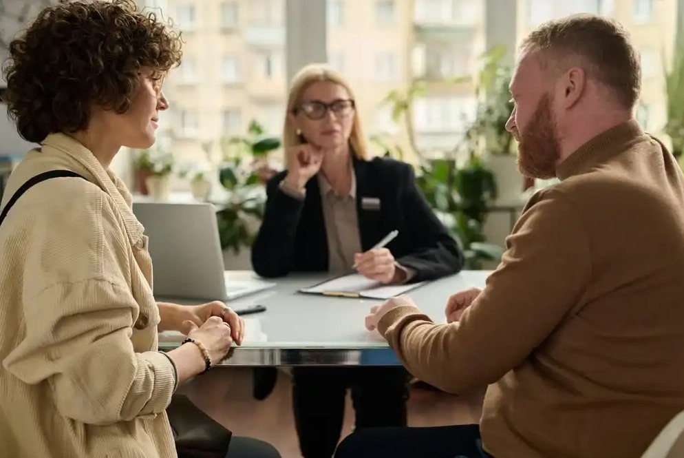 Divorced couple discussing financial rights