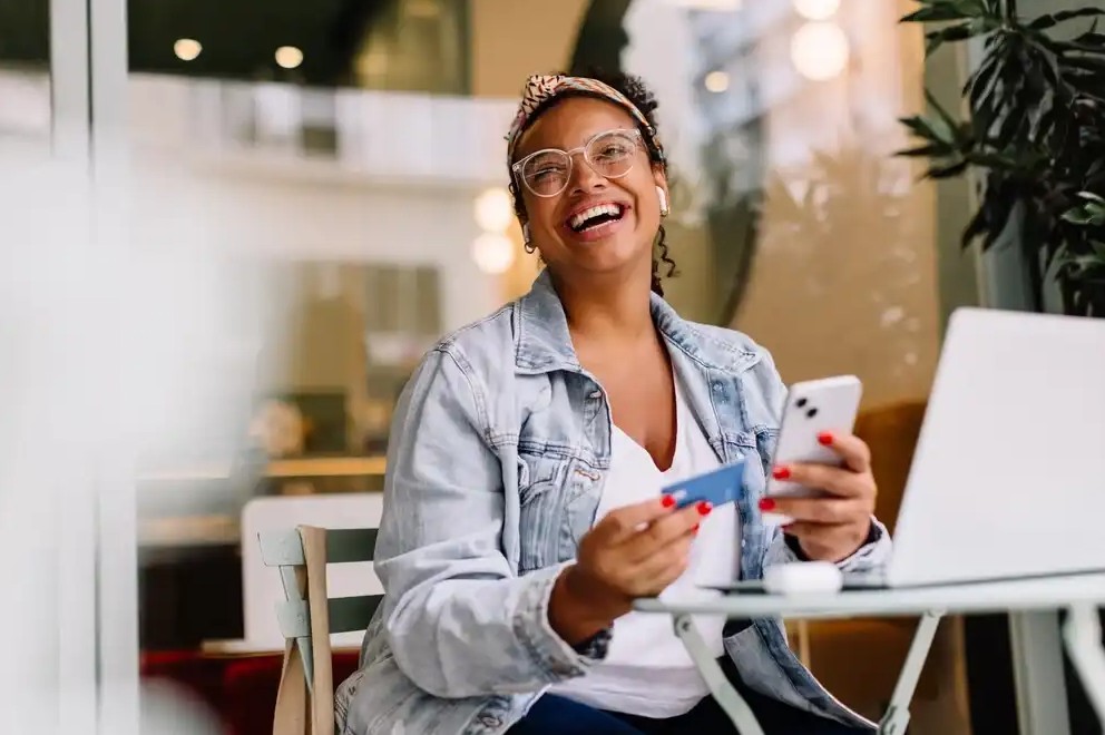 Woman checking ACH payments online